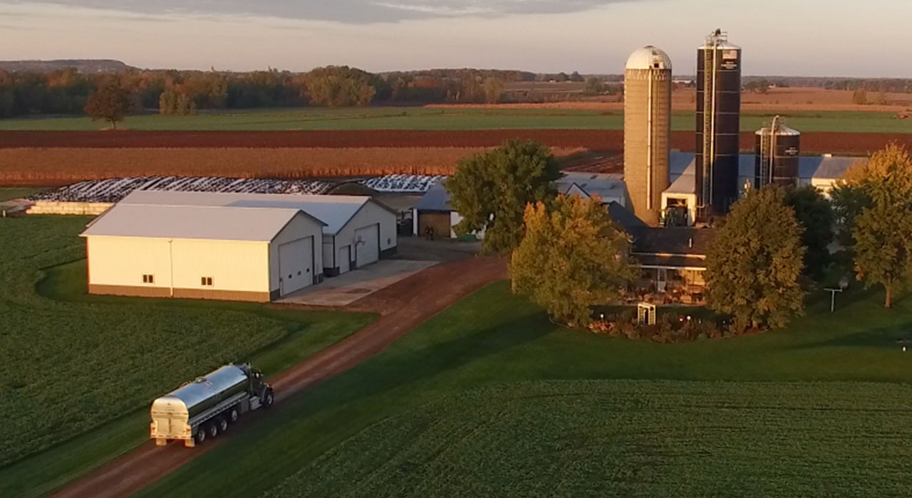 Milk truck arriving in the evening.