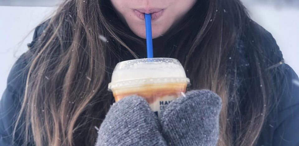 Guest gloved hand holding a Concrete Mixer