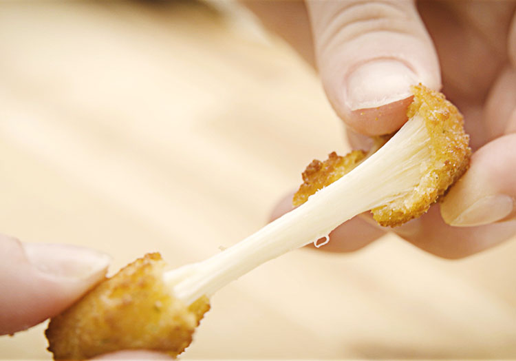 Ooey-gooey Wisconsin Cheese Curd pull.